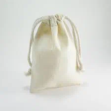 A small drawstring pouch of undyed cotton muslin